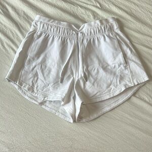 white lululemon inner glow shorts!! 3”